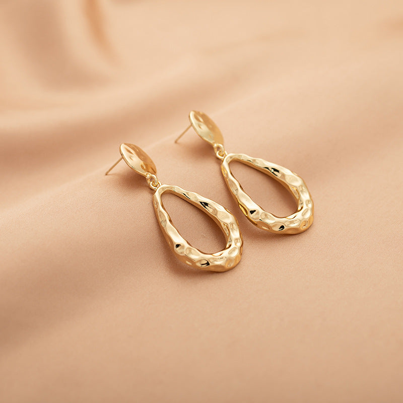 Hollow Waterdrop Pendant Gold Earrings Fashionable Style
