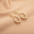 Hollow Waterdrop Pendant Gold Earrings Fashionable Style